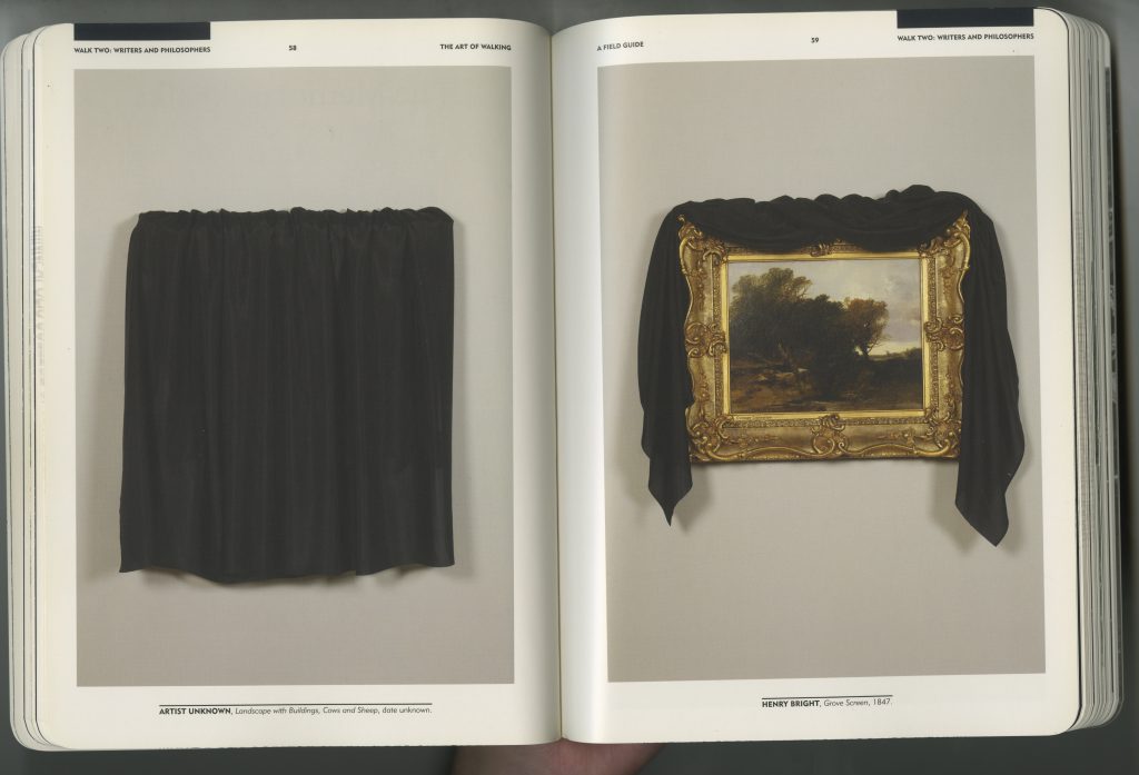 a gold framed painting with a curtain