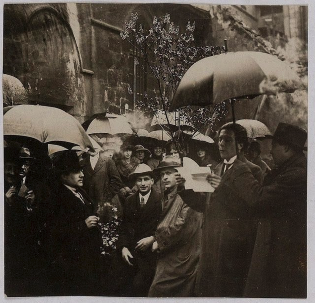 Tristan Tzara reads to the crowd at a “Dada excursion” at Saint-Julien-le-Pauvre church (1921) Paris