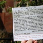 photo of a handout describing sales of slaves